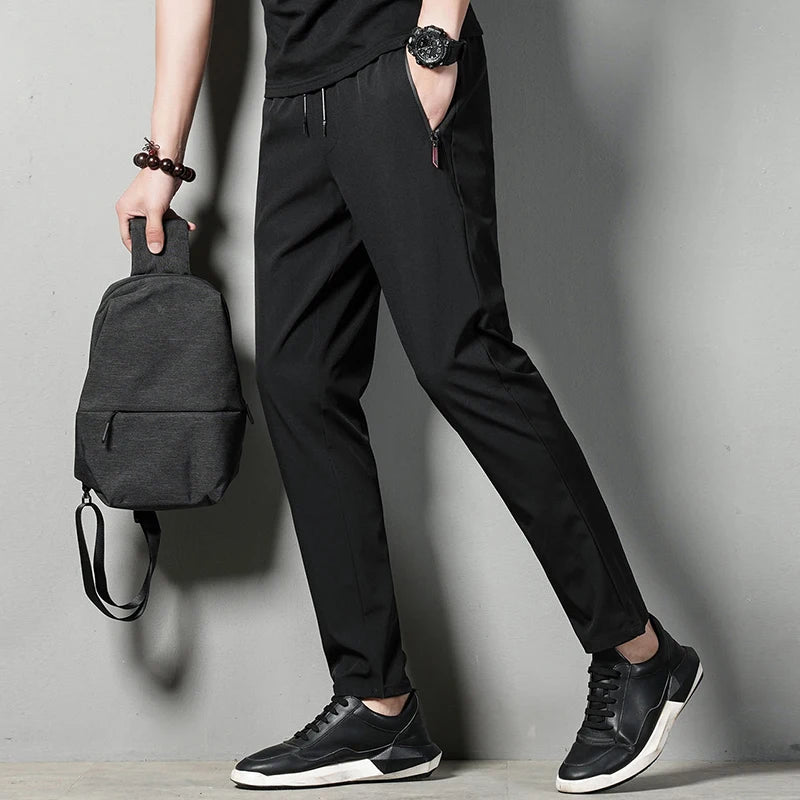 Summer men's casual pants slim fit thin Korean version ice silk pants Jinlun sports pants straight tube quick drying pants